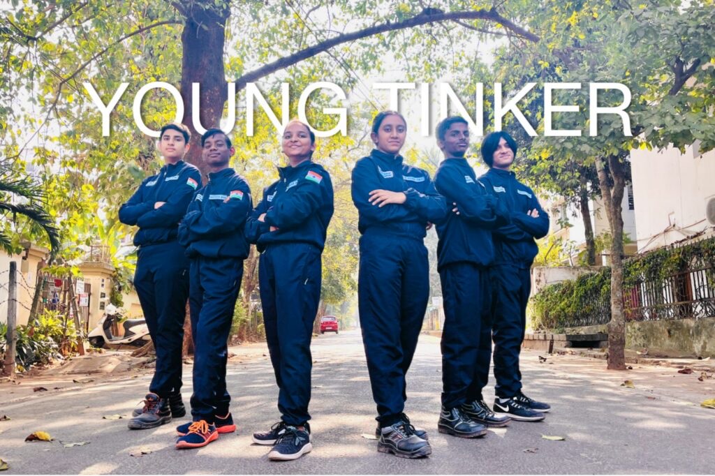 The six students of the Young Tinker NASA team standing with their arms folded